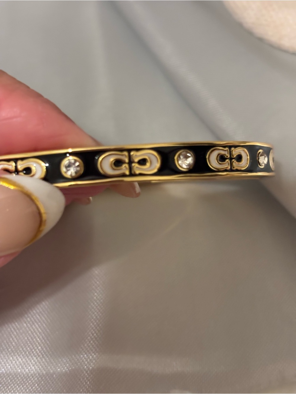 Coach Gold-Tone and Black Enamel Crystal Logo Bangle Bracelet